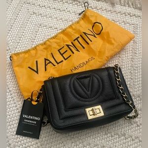 Black Valentino Handbag by Mario Valentino. Almost new. Used only 3 times